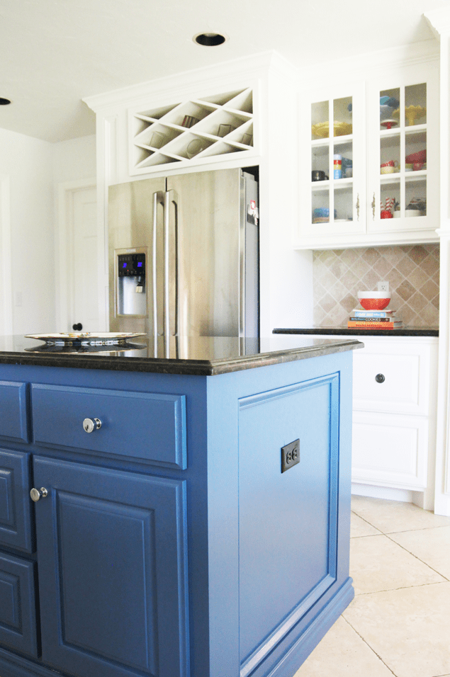 White kitchen with blue island